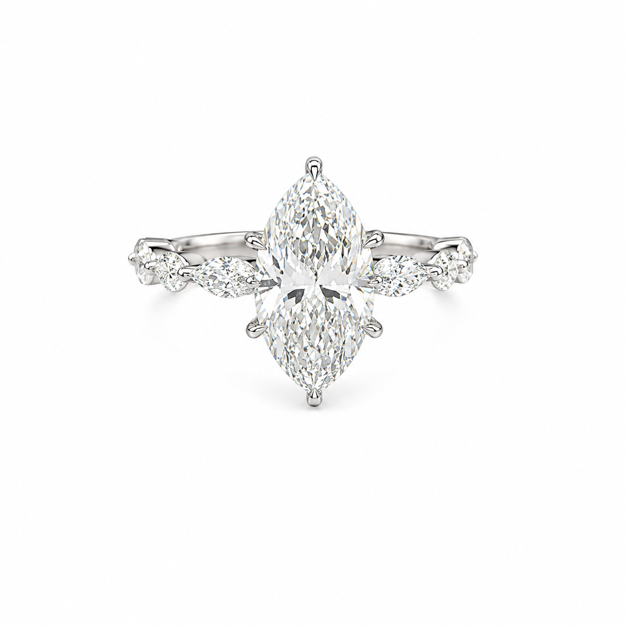 Diamond ring with a central pear-shaped diamond and smaller diamonds on a white background