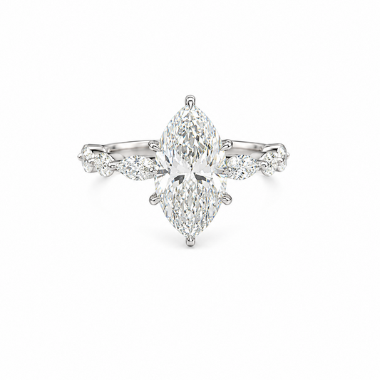Diamond ring with a central pear-shaped diamond and smaller diamonds on a white background