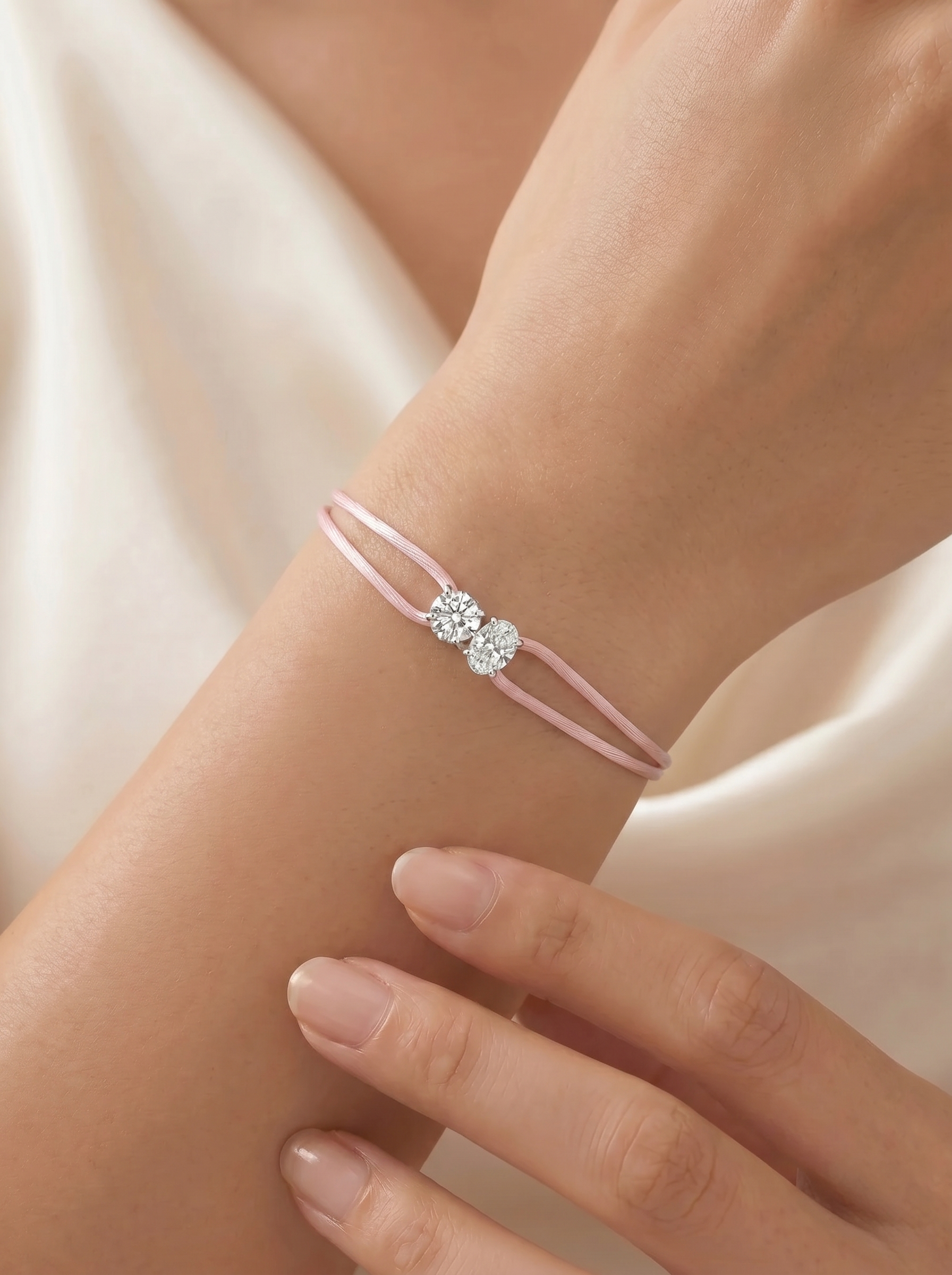 Satin Cord Bracelet Double Oval in pink, worn on wrist