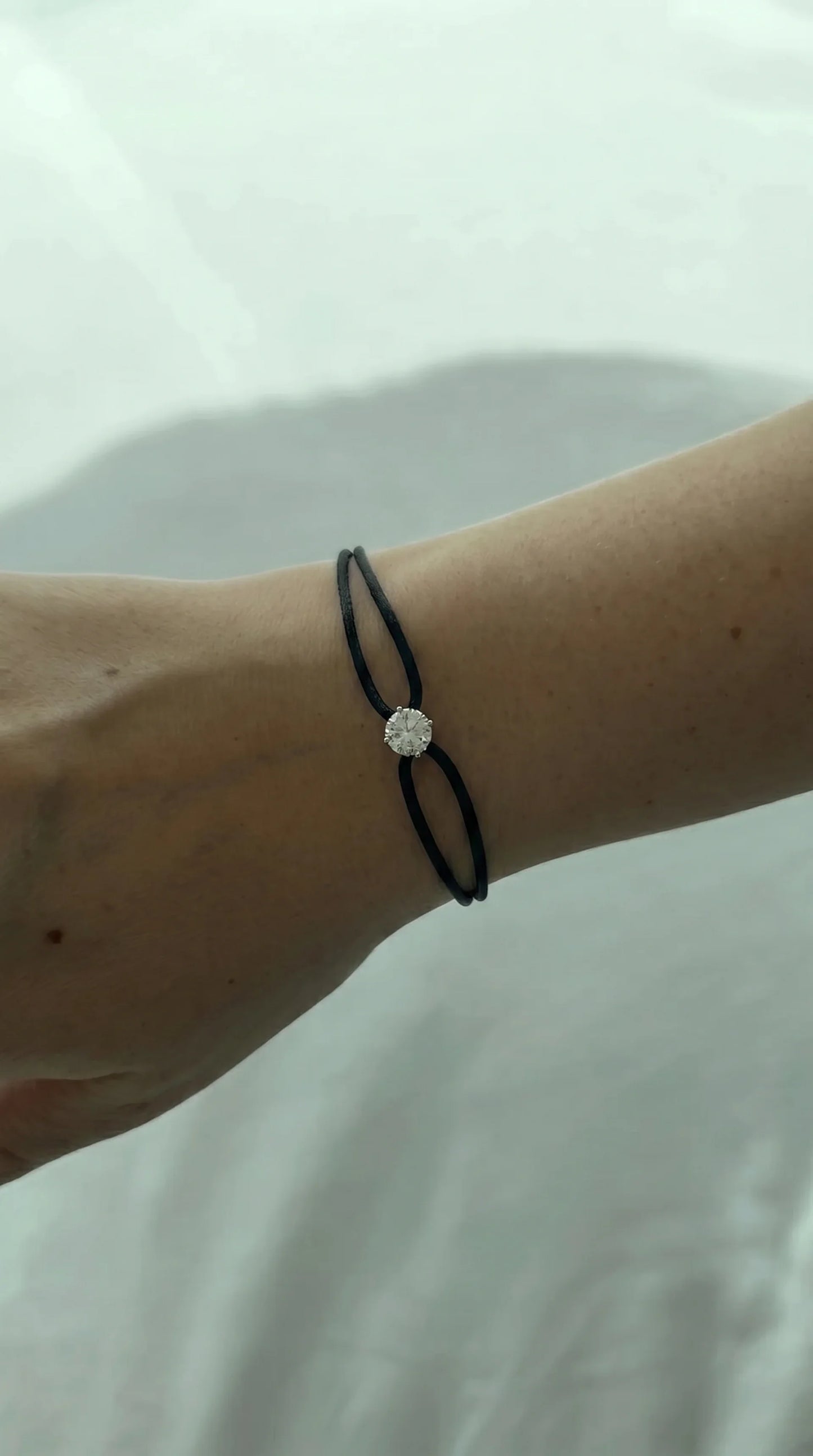 Satin Cord Bracelet in black, lifestyle view