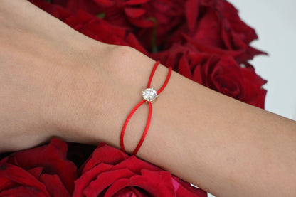 Dennis Luxe Satin Cord Bracelet in red, styled with flowers