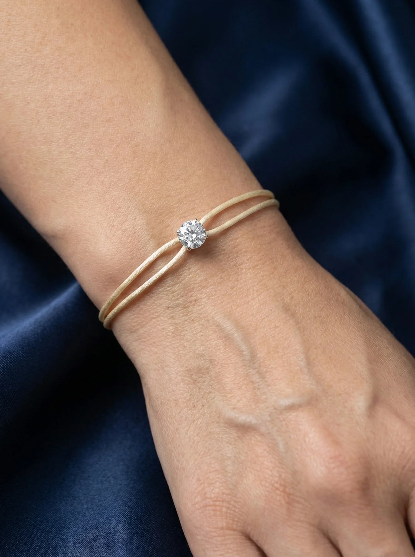 Dennis Luxe beige satin cord bracelet, model lifestyle view