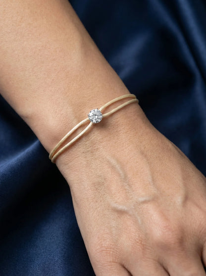Dennis Luxe beige satin cord bracelet, model lifestyle view