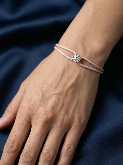 Dennis Luxe pink satin cord bracelet, model lifestyle view