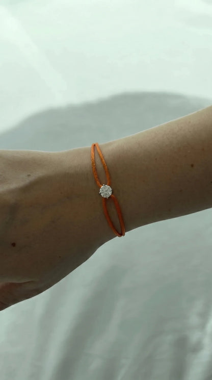 Satin Cord Bracelet in orange, lifestyle view
