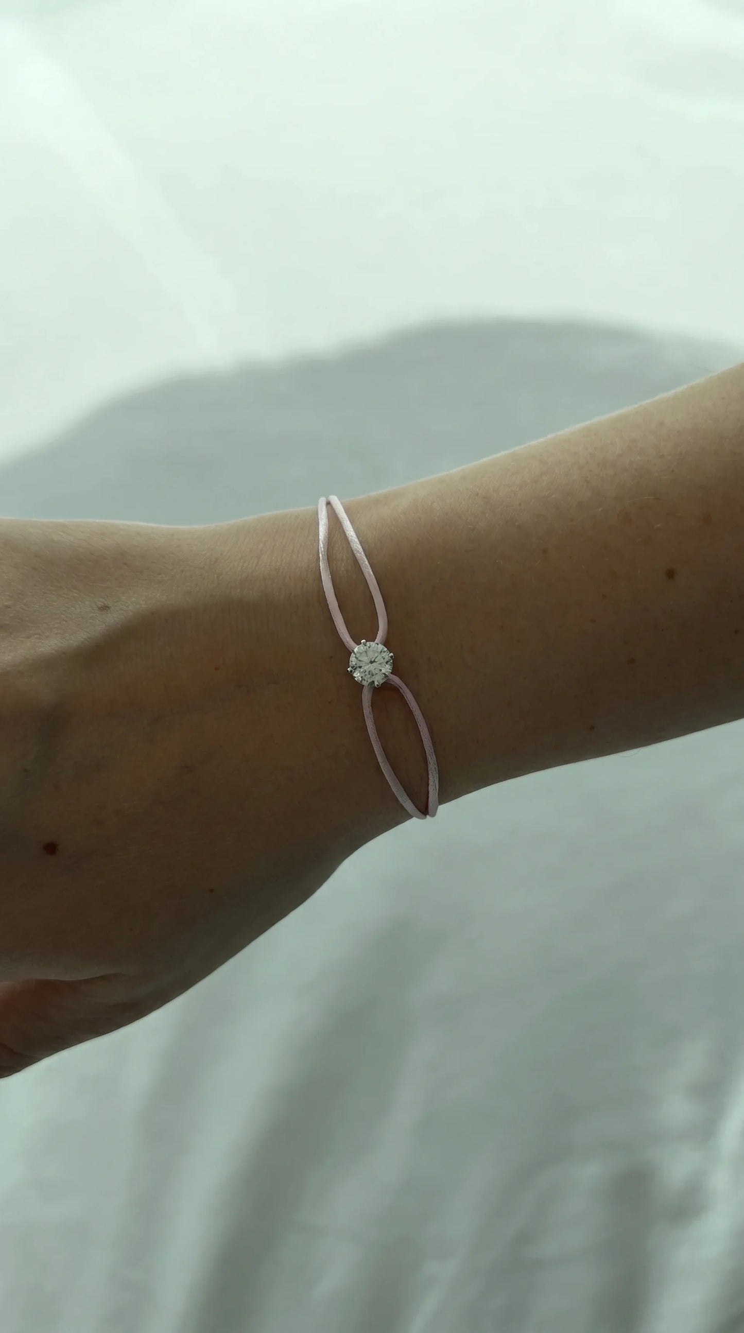 Satin Cord Bracelet in pink, lifestyle view