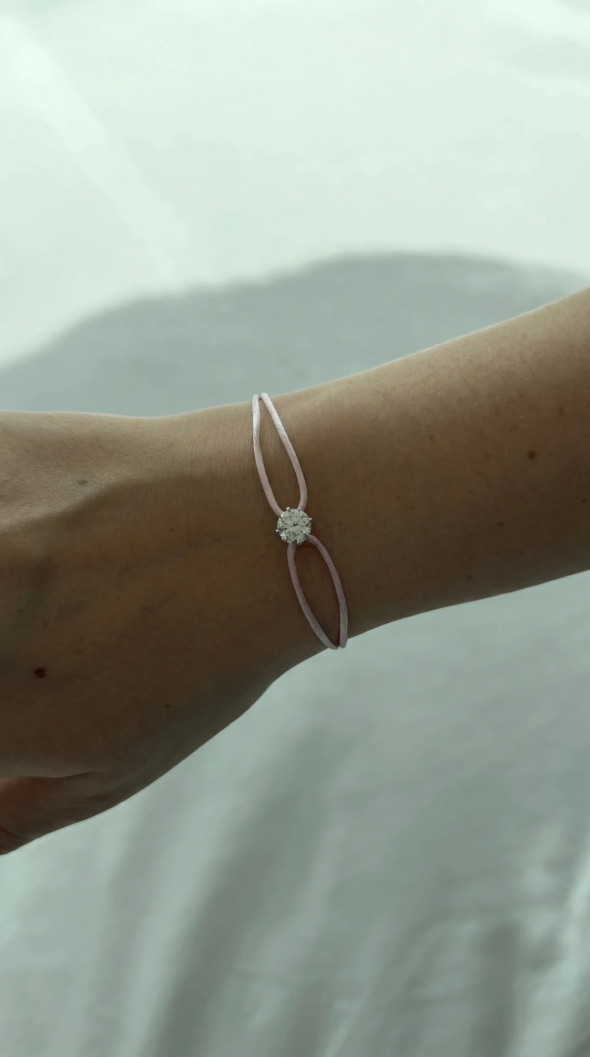 Satin Cord Bracelet in pink, lifestyle view