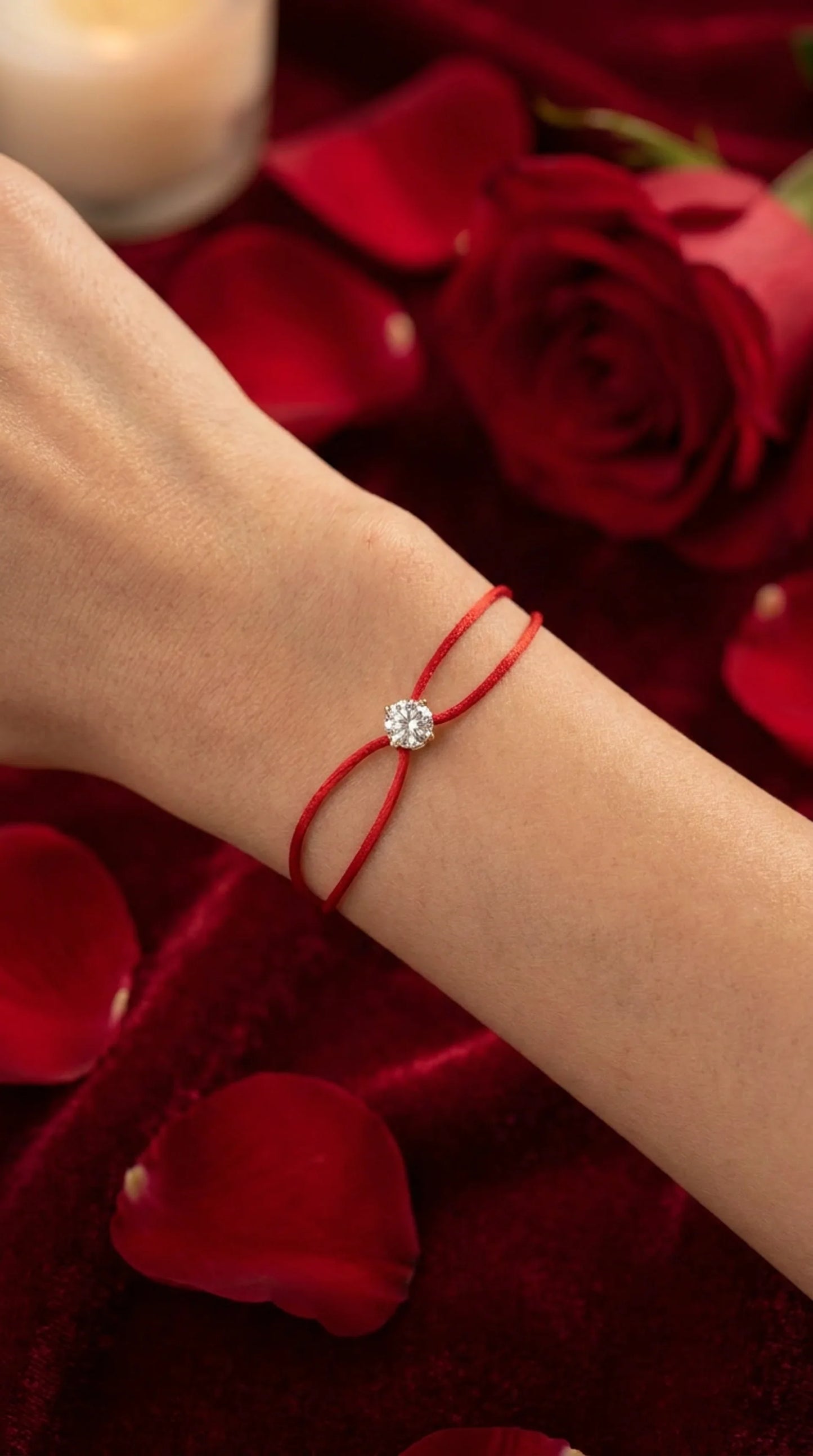 Satin Cord Bracelet in red, styled with flowers