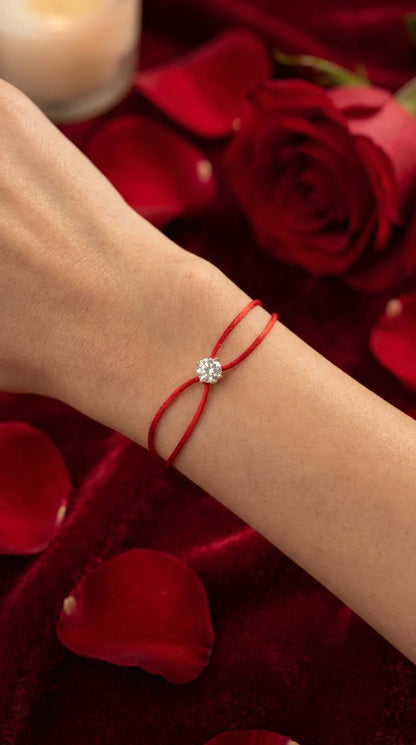 Satin Cord Bracelet in red, styled with flowers