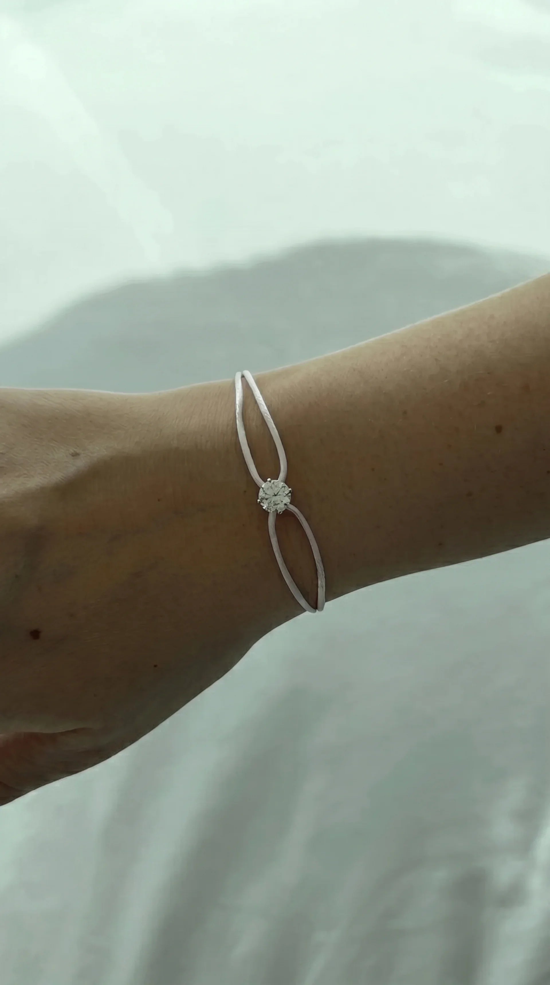 Satin Cord Bracelet in white, lifestyle view