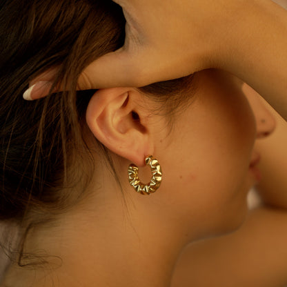 Gaia Gold Italian Chunky Earrings in 18K yellow gold worn on model