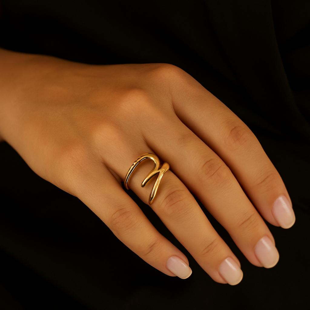 Gaia Gold Wave Ring in 18K yellow gold worn on hand