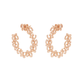 Rose gold hoop earrings on a white background