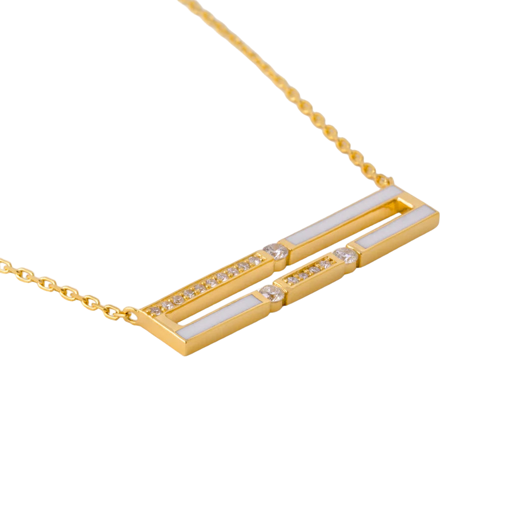 Gold necklace with a rectangular pendant on a white background