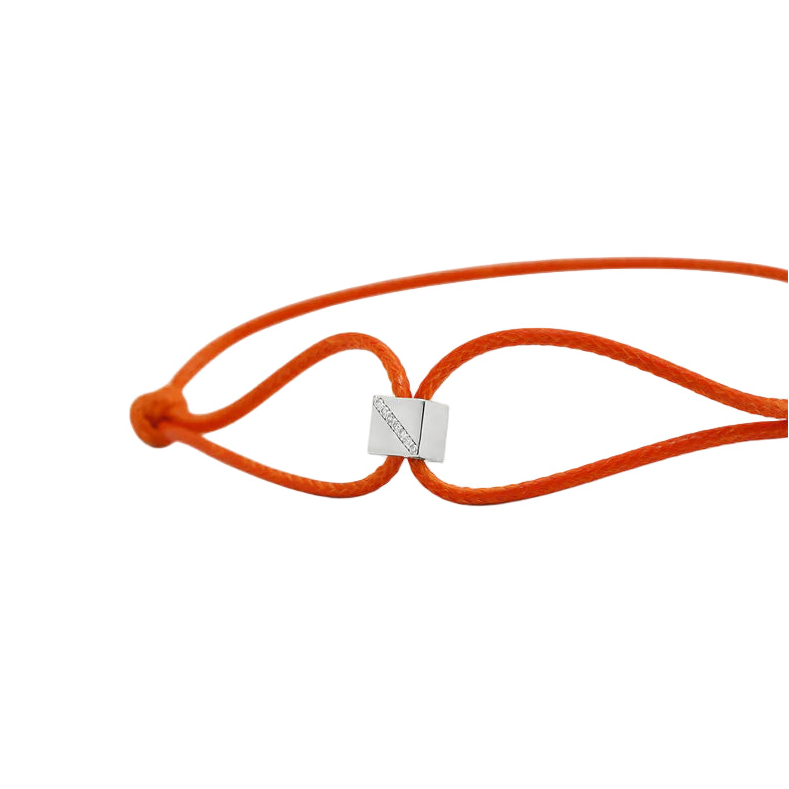 Orange cord with a gold clasp on a white background