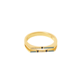 Gold ring with embedded stones on a white background