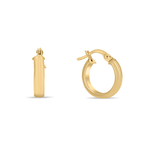 Gold hoop earrings on a white background