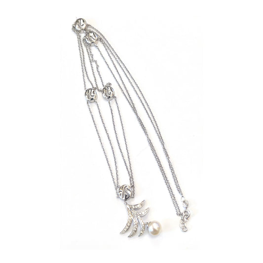 18K white gold Sea Waves Necklace with pearl and diamond details on a white background