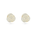 Pair of white floral earrings with gold accents on a white background