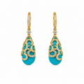Pair of turquoise earrings with gold and diamond accents on a white background