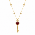 18k gold key-shaped necklace with ruby