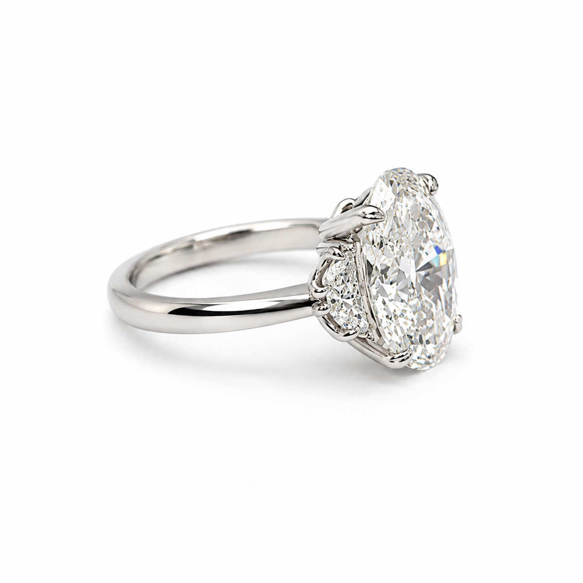 18K white gold Nova Ring with oval-cut lab-grown centre diamond and half-moon side stones on a white background