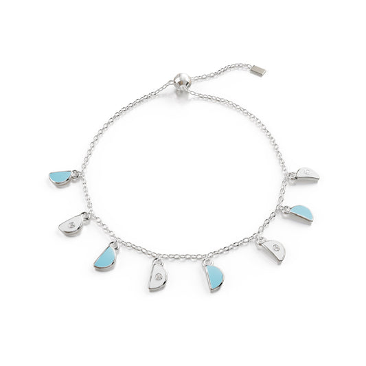 18k white gold charm bracelet with blue and white enamel, dome-inspired design