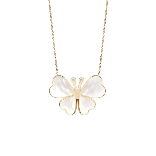Butterfly-shaped pendant necklace with gold frame and white stones on a white background