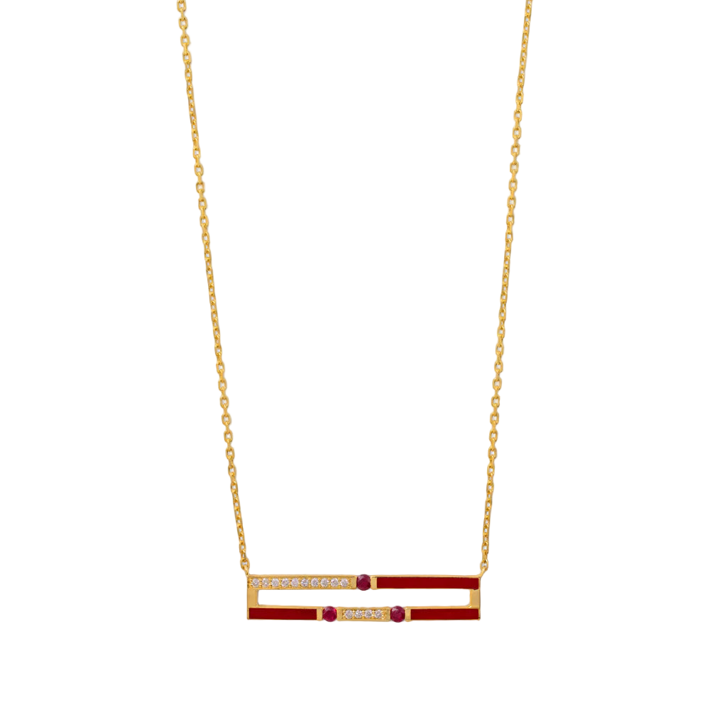 Gold necklace with a red and gold pendant on a white background