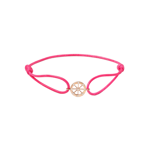 Pink bracelet with a gold charm on a white background