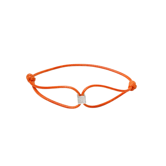 Orange bracelet with a gold clasp on a white background