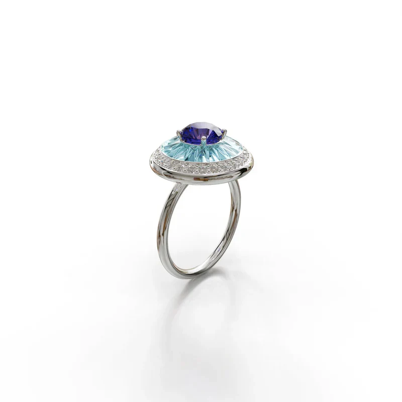 18k white gold ring with tanzanite, diamond halo, and sky blue enamel