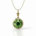 18k yellow gold pendant with verdelite, diamond halo, and green enamel