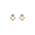 Nur Hilya Stud Earrings in yellow gold on white background