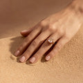 Nur Tesra Morganite Ring in 18k yellow gold worn on the hand