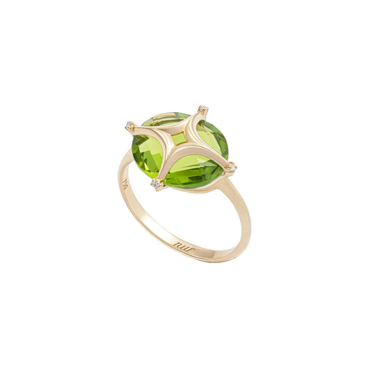 Nur Tesra Peridot Ring in 18k yellow gold on white background