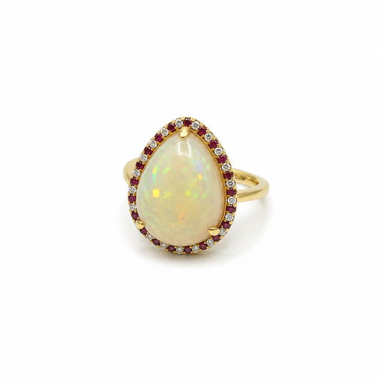 DTopaz Australian Opal & Ruby Ring in 18K gold on a white background
