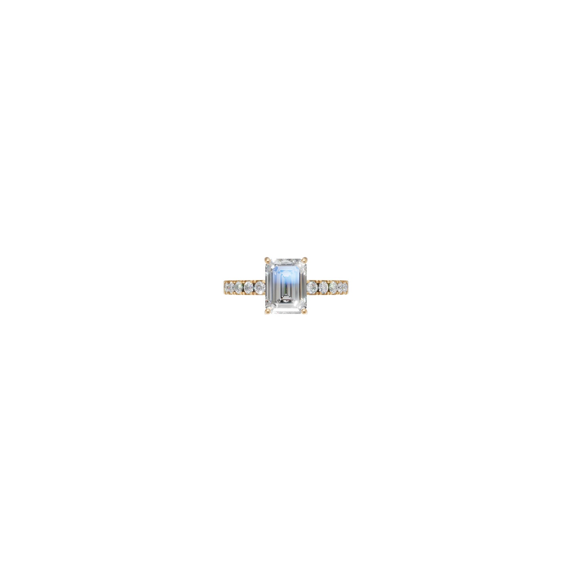 Rulla Emerald Solitaire Diamond Ring in yellow gold on white background