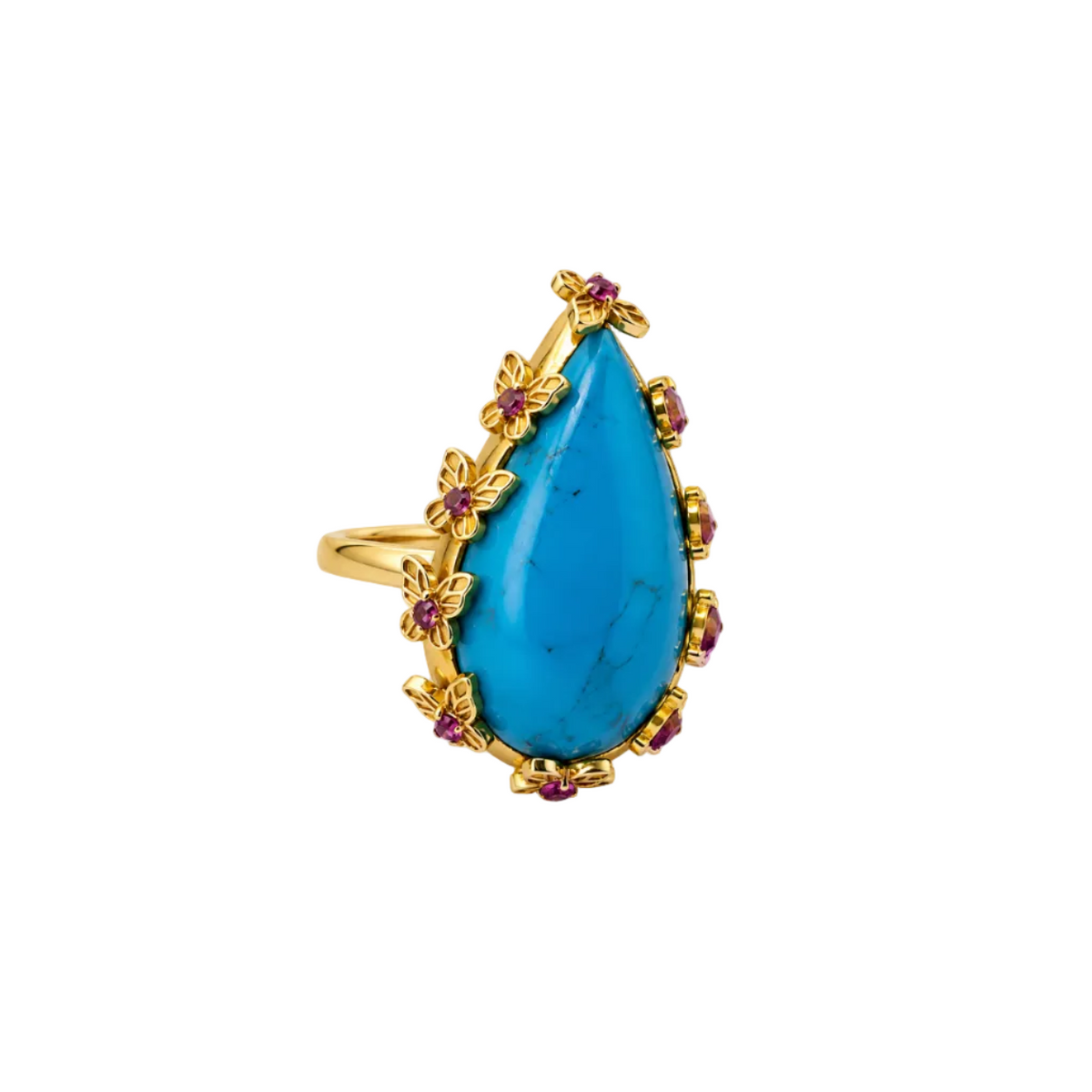 Gold ring with a large blue teardrop gemstone and smaller red stones on a white background