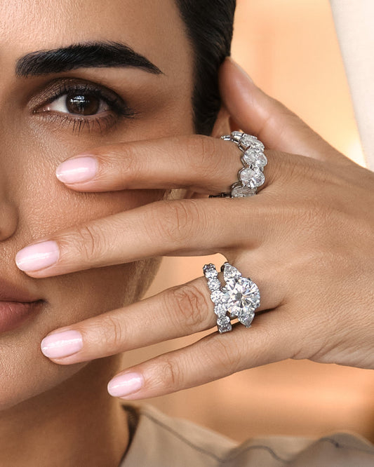 Model wearing Verbesa Atelier 4ct round-cut lab-grown diamond three-stone engagement ring