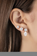 White Drop Double Round and Oval Diamond Drop Studs worn in an original lifestyle image