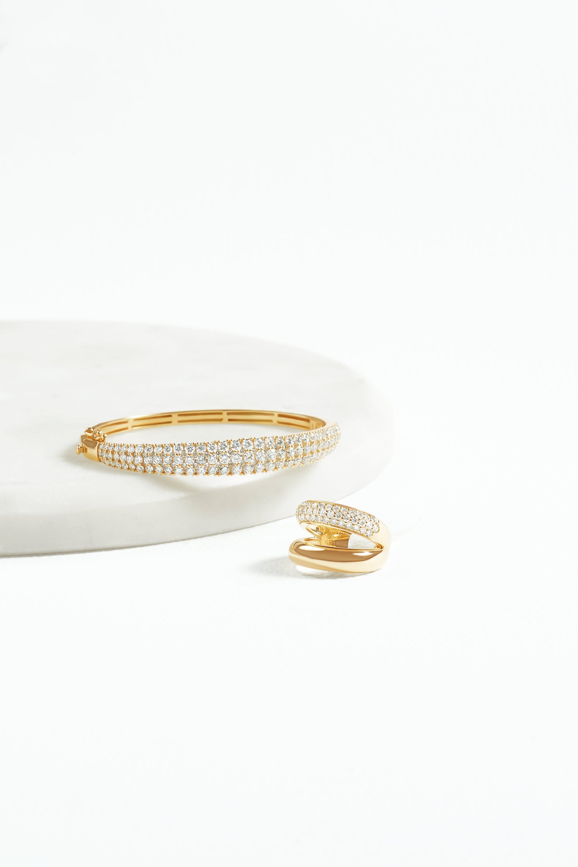White Drop dune three row bangle worn in an original lifestyle image