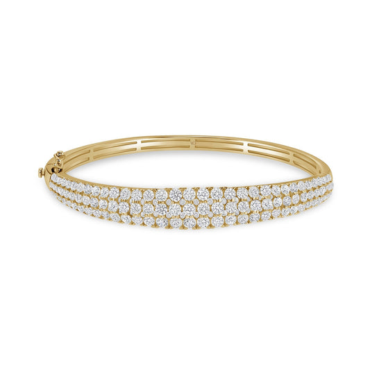 White Drop Dune Three Row Bangle in 18K yellow gold on a white background