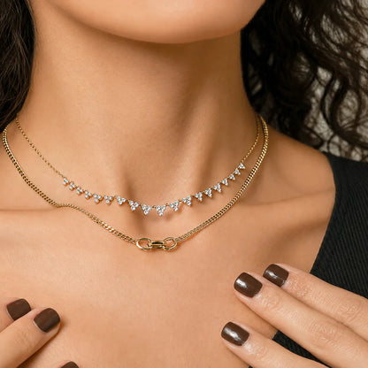 White Drop Long Stardust Necklace in yellow gold worn in an original model image
