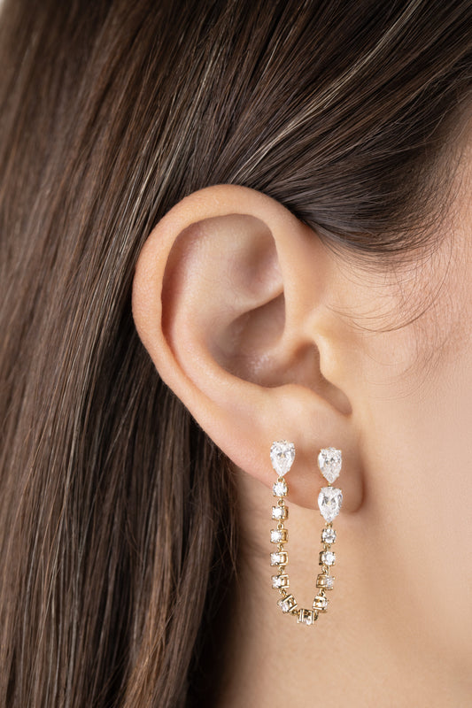 White Drop pear chain earring worn in an original lifestyle image
