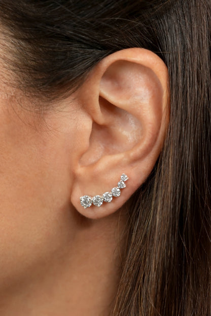 White Drop round six diamond ear climber worn in an original lifestyle image