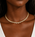 White Drop Stardust Marquise Necklace in yellow gold worn in an original model image