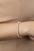 White Drop stardust tennis bracelet worn in an original lifestyle image