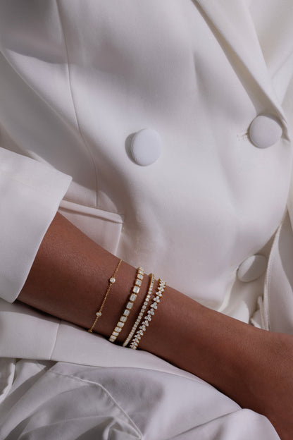 White Drop stardust tennis bracelet worn in an original lifestyle image