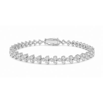 White Drop Stardust Tennis Bracelet in 18K white gold on a white background
